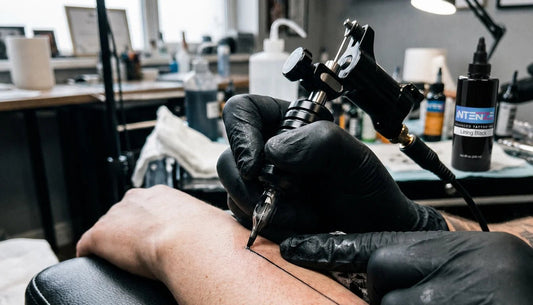  A single-needle tattoo machine tattoos a precise, thin black line.